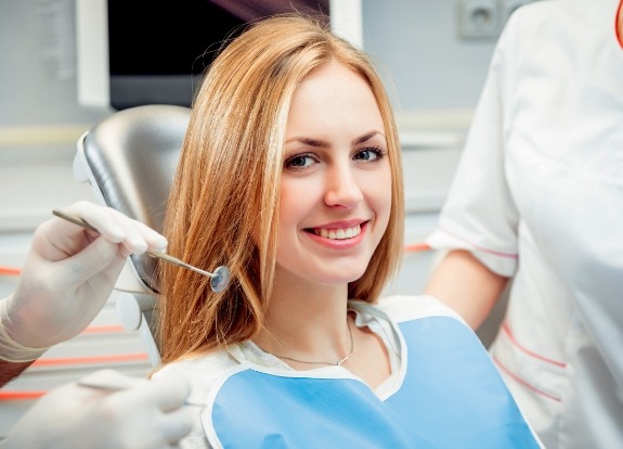 Young woman smiling during dental visit